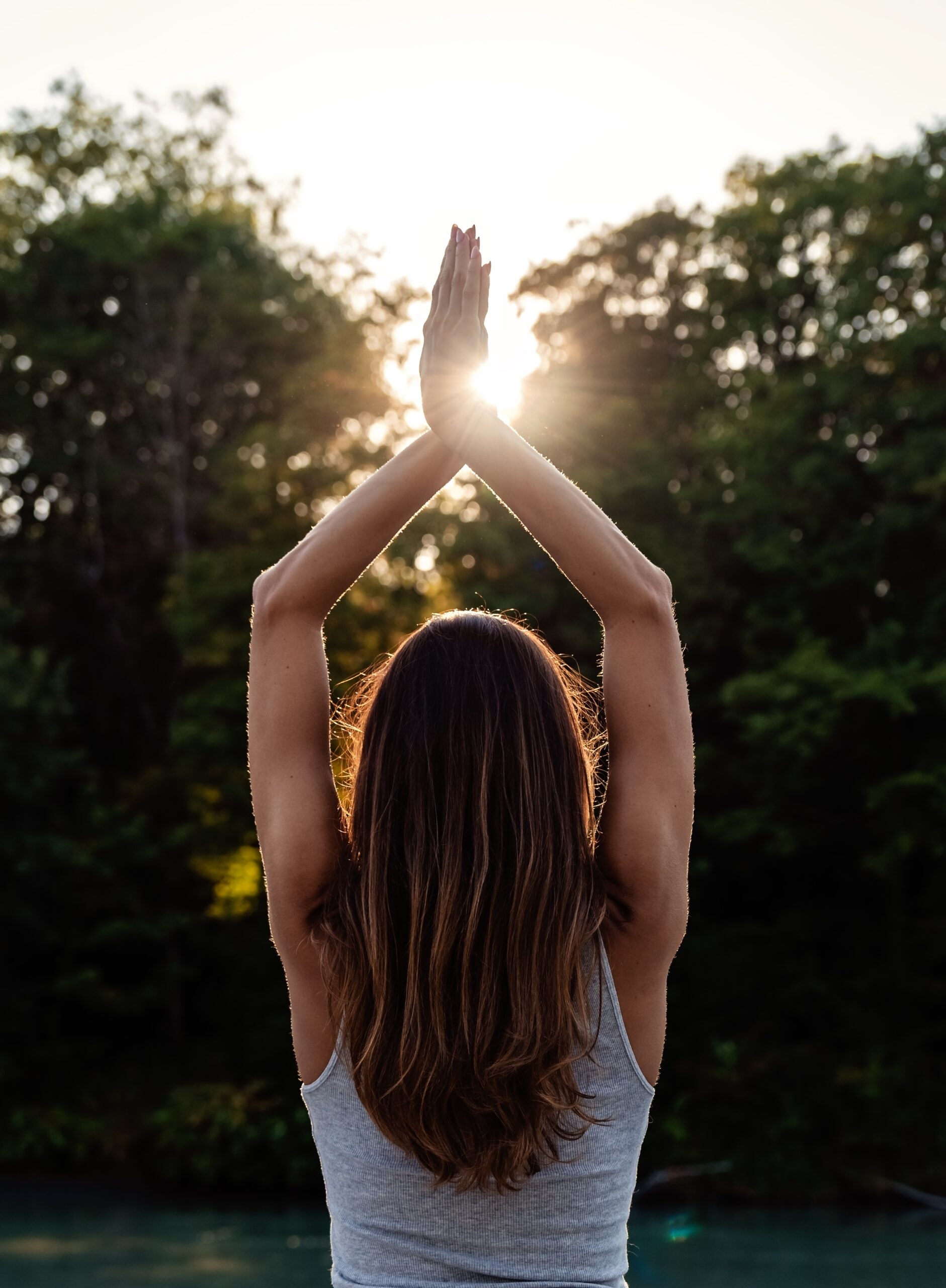 Back,Rear,View,Of,Happy,Young,Woman,Standing,At,Nature